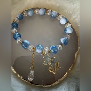 Blue Glass Beaded Bracelet with Butterfly Charm - Gold Accent